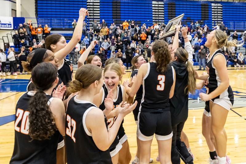 Lincoln-Way West celebrates after winning the 4A L-W East Regional Championship game against Lincoln-Way East on Feb. 20, 2025.