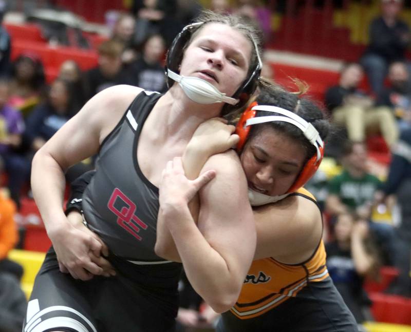 McHenry’s Natalie Corona, right, battles Ella Cooper of Oswego East at 145 pounds in the title bout of varsity girls IHSA Sectional wrestling on Saturday, February 14, 2026, at Schaumburg High School in Schaumburg.
