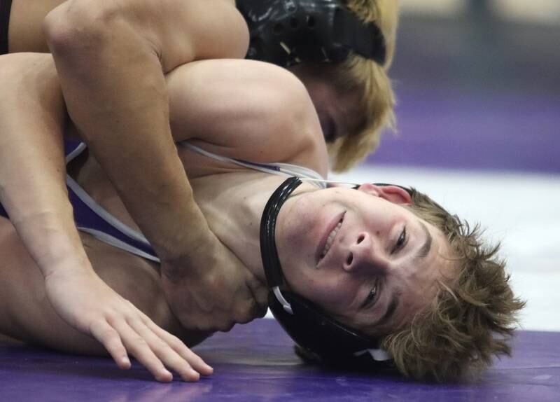 Hampshire’s William Randle-Zeglis battles Prairie Ridge’s Andrew Cioper at 144 pounds in varsity wrestling on Thursday, Dec. 5, 2024 at Hampshire High School in Hampshire.
