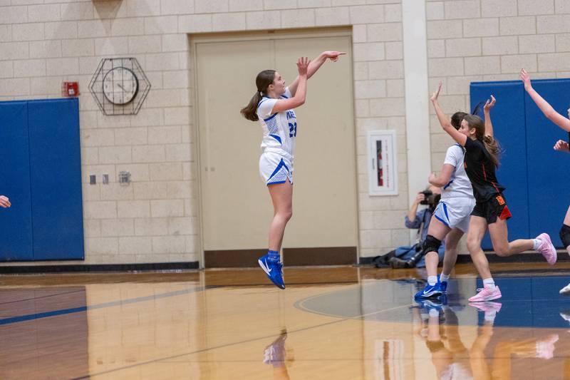 Geneva's Nora Hatton shots a three pointer against Batavia on Friday, Dec.19,2025 in Geneva.