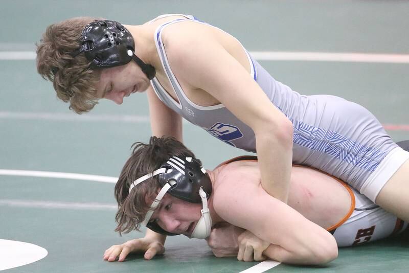 Princeton's Kane Dauber Sandwich's Colten Stone in the 132 pound weight class during the Class 1A Regional meet on Saturday, Feb. 8, 2025 at St. Bede Academy.