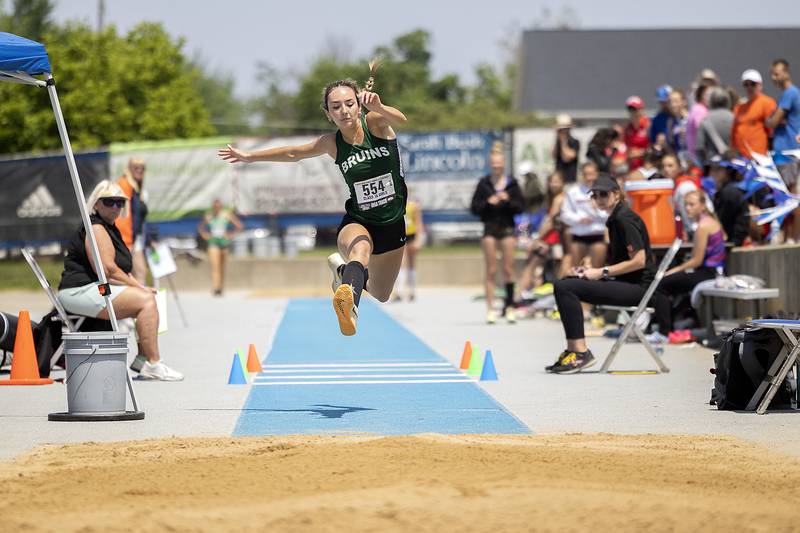 St. Bede’s Anna Lopez makes her attempt in the 1A triple jump Saturday, May 20, 2023 during the IHSA state track and field finals at Eastern Illinois University in Charleston.