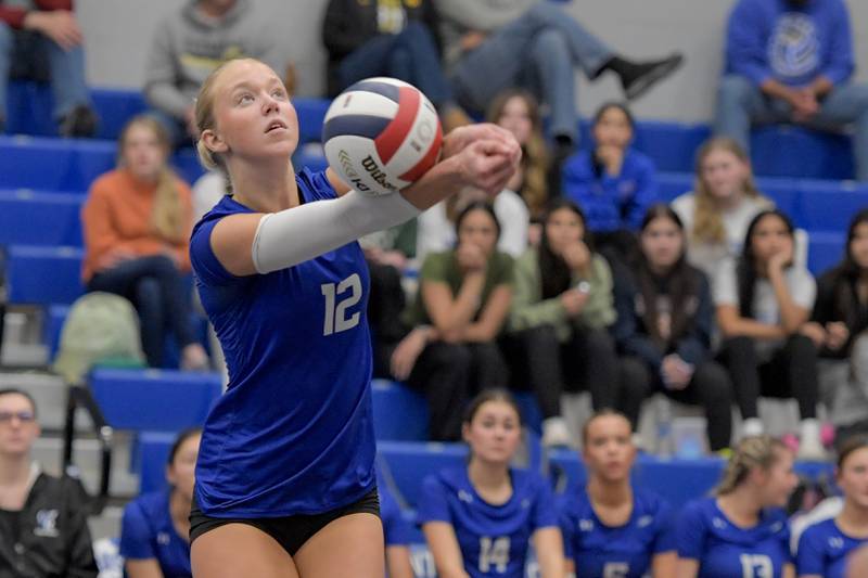 Central's Leah Freesemann (12) keeps the ball in play against Sycamore during the Class 3A Burlington Central Girls Volleyball Regional on Thursday, Oct. 26, 2023.