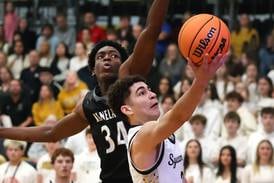 Photos: Kaneland boys basketball travels to Sycamore for conference matchup
