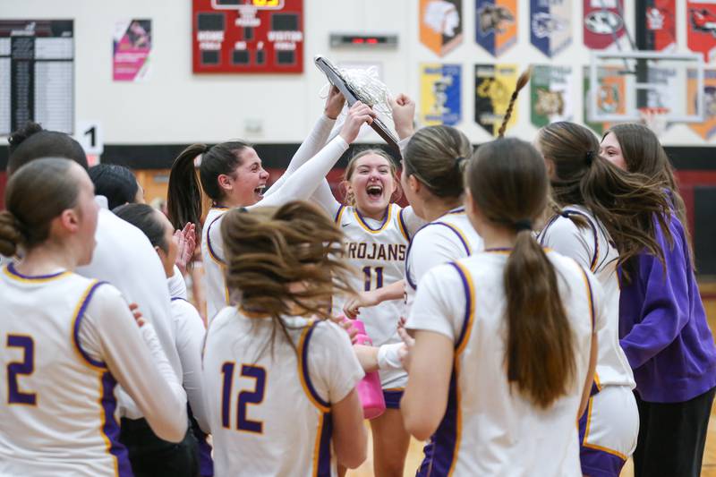 Downers Grove North celebrates the win in their Regional Final basketball game between Downers Grove North at Plainfield North. Feb 20, 2025 in Plainfield.