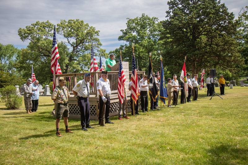 The Master of Ceremonies, Sam Ramirez, introduces speakers at the Oakwood cemetery in Dixon for Memorial Day services Monday, May 29, 2023.