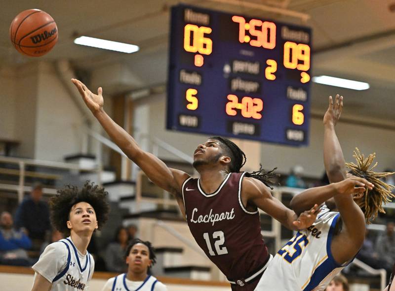 Lockport's Jalen Falcon stretches out for a layup against Joliet Central on Monday, Jan. 30, 2023, at Joliet.
