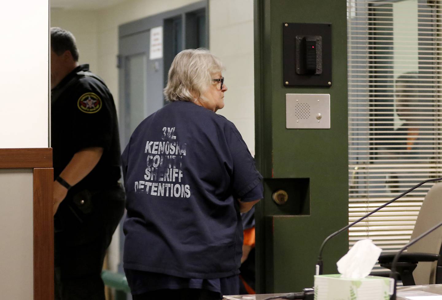 Roxanna L. Collins, 70, of McHenry, looks into the gallery on Tuesday, June 3, 2025, as she leaves her initial appearance in Kenosha County Court. She was charged with first-degree intentional homicide in the 2003 death of her husband, David Vanderzee.