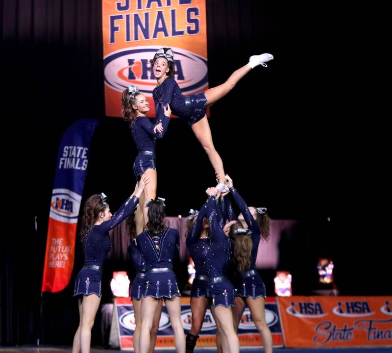 Members of the Cary-Grove cheerleading team compete in the medium team division of the IHSA State Finals on Saturday, Feb. 8, 2025 at Grossinger Motors Arena in Bloomington.
