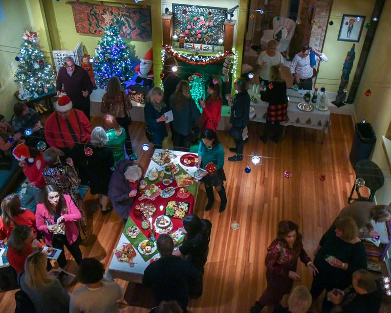 Community members gather to enjoy some food and drinks at the Padgett Home on North Kensington during the Holiday Sip and Sweet Tour held in La Grange on Sunday Dec. 17, 2023.