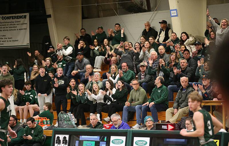 St. Bede fans cheer on their team as they won during an upset over Marquette in the Class 1A Regional semifinal on Wednesday, Feb. 22, 2023 at Midland High School.