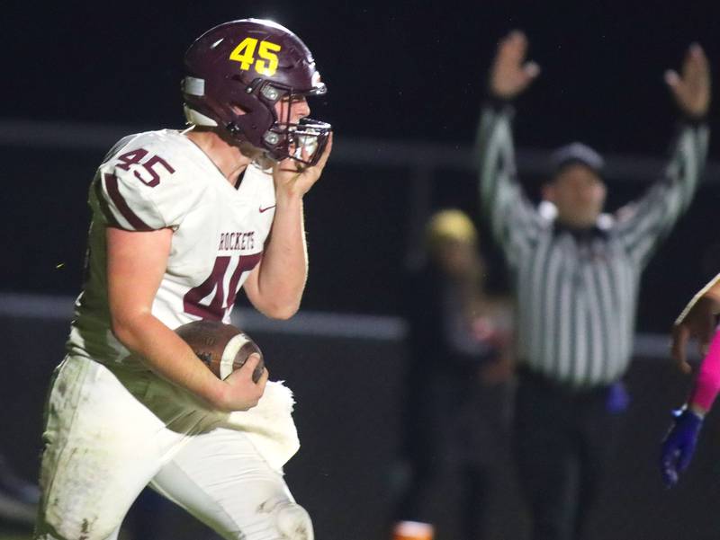 Richmond-Burton’s Riley Shea lands in the end zone with a touchdown  in IHSA football Class 3A second-round playoff action at Bob Stewart Field on the campus of Aurora Central Catholic High School in Aurora on Friday, November 7, 2025.