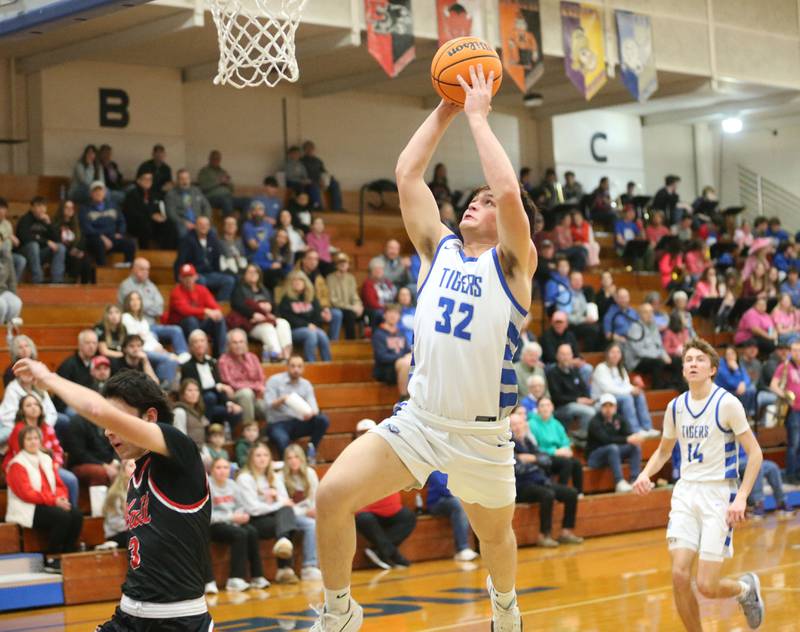 Princeton's Owen Hartman drives to the hoop over Hall's Noah Plym on Friday, Feb. 13, 2026 at Princeton High School.