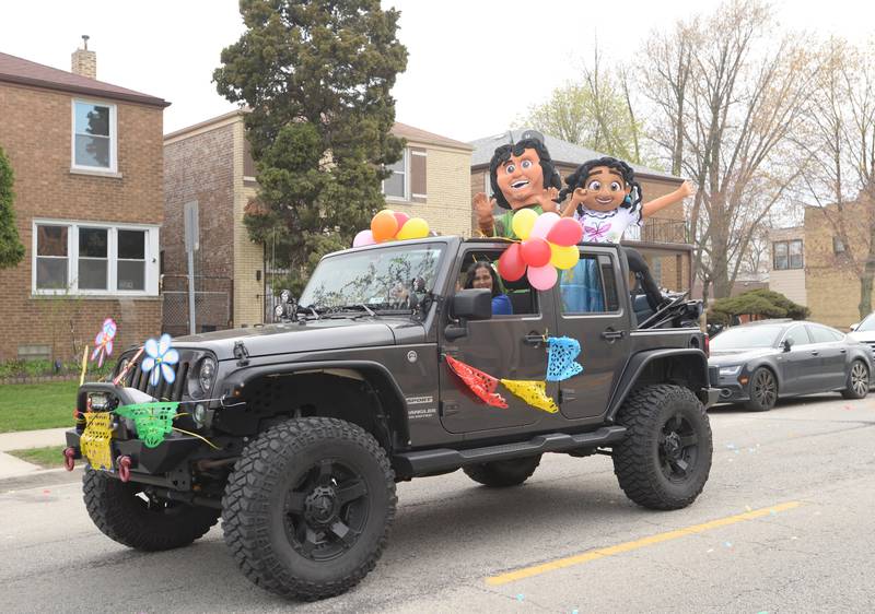 District 98's Dia de los Niños parade includes several characters Friday April 29, 2022.
