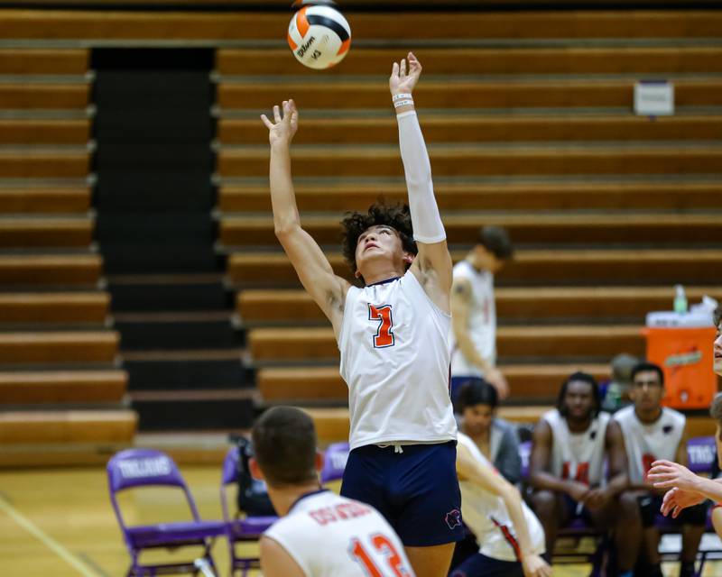 Oswego's Jack Hawkins (7) sets up a shot during Downers Grove North Regional final match between Oswego at Downers Grove North. May26, 2022.