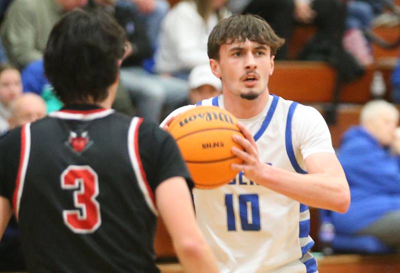 Princeton's Gavin Lanham looks to pass around Hall's Noah Plym on Friday, Feb. 13, 2026 at Princeton High School.