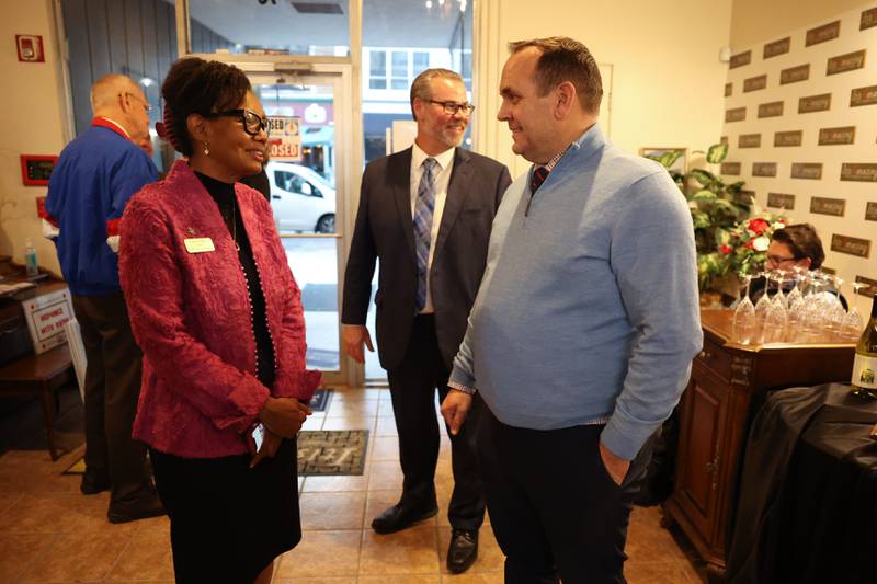 Diane Harris, candidate for State Senate, and Will County Judge Daniel Rippy talk at Its Amazing GOP event at Its Amazing in Joliet on Monday.