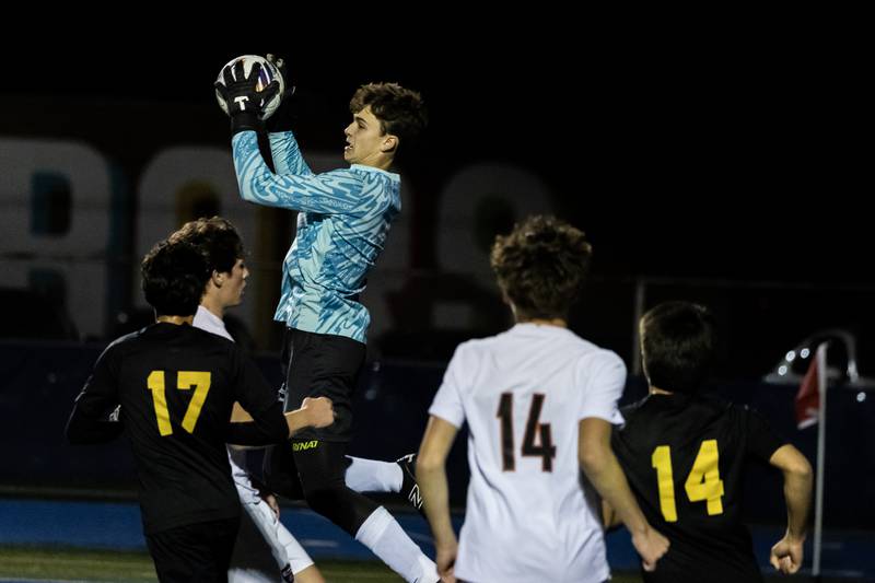 Lincoln-Way Central's Josh DeMik makes a nice save during a Class 3A Boys Soccer Super-Sectional game against St. Laurence at Lyons Township High School’s South Campus on Nov. 3, 2025.