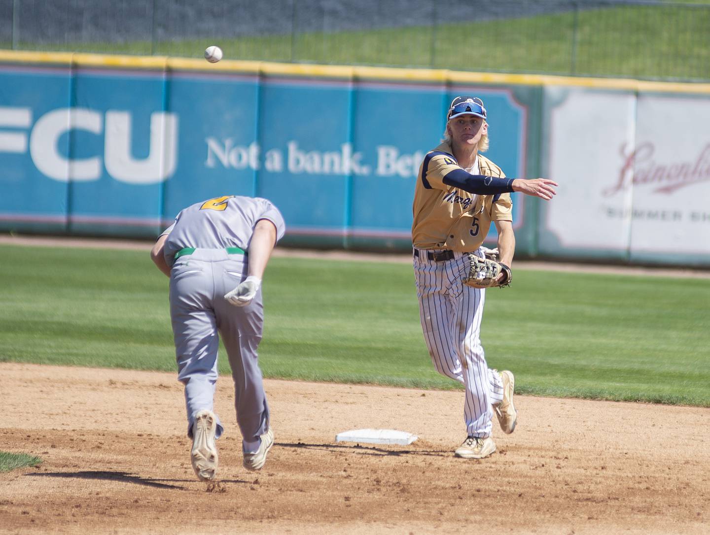 Ottawa-Marquette’s Logan Nelson completes the double play against Brown County Friday, June 3, 2022 during the IHSA Class 1A baseball state semifinal.