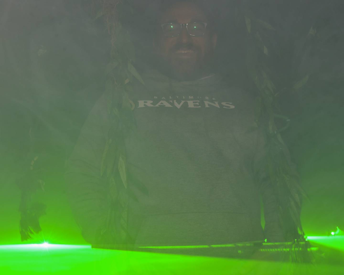 Phil Dienoff is all smiles on Wednesday Oct. 16, 2024, as he stands in his favorite prop of his haunted yard trail display known as the swamp. He has spent 16 hours creating his swamp that sits in his back yard of his home in Oswego.