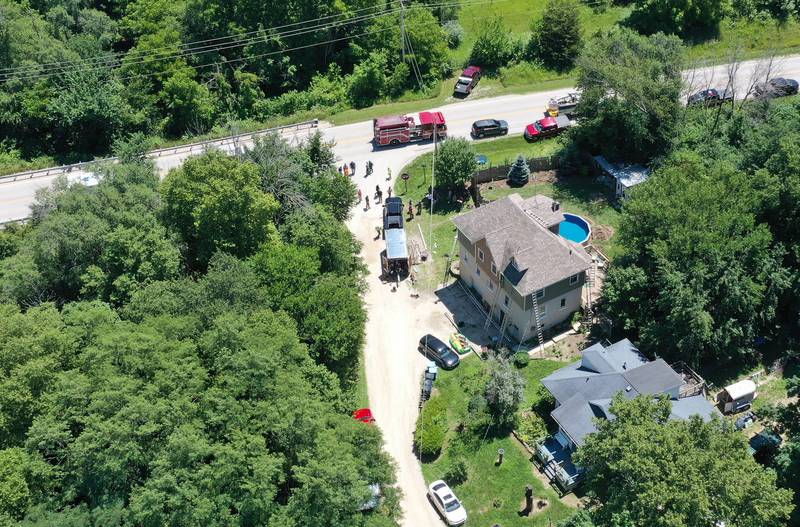 La Salle Co. Sheriff along with multiple Fire and EMS Companies work the scene at East 15th and North 1659th Road in Bruce Township on Tuesday July 12, 2022. Multiple injuries were  reported late Tuesday morning as workers with a home improvement company sustained electrical shocks in rural La Salle County, east of Leonore. The incident happened shortly after 11a.m.