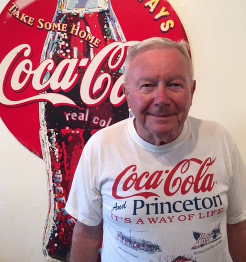 Mr. Coca-Cola Dick Volker of Princeton recently presented The History of Coca-Cola to more than 550 Coca-Cola Collectors Club members from all over the world at the 50th Anniversary of the organization during a weeklong event at the Isle Casino Hotel in Bettendorf, Iowa.