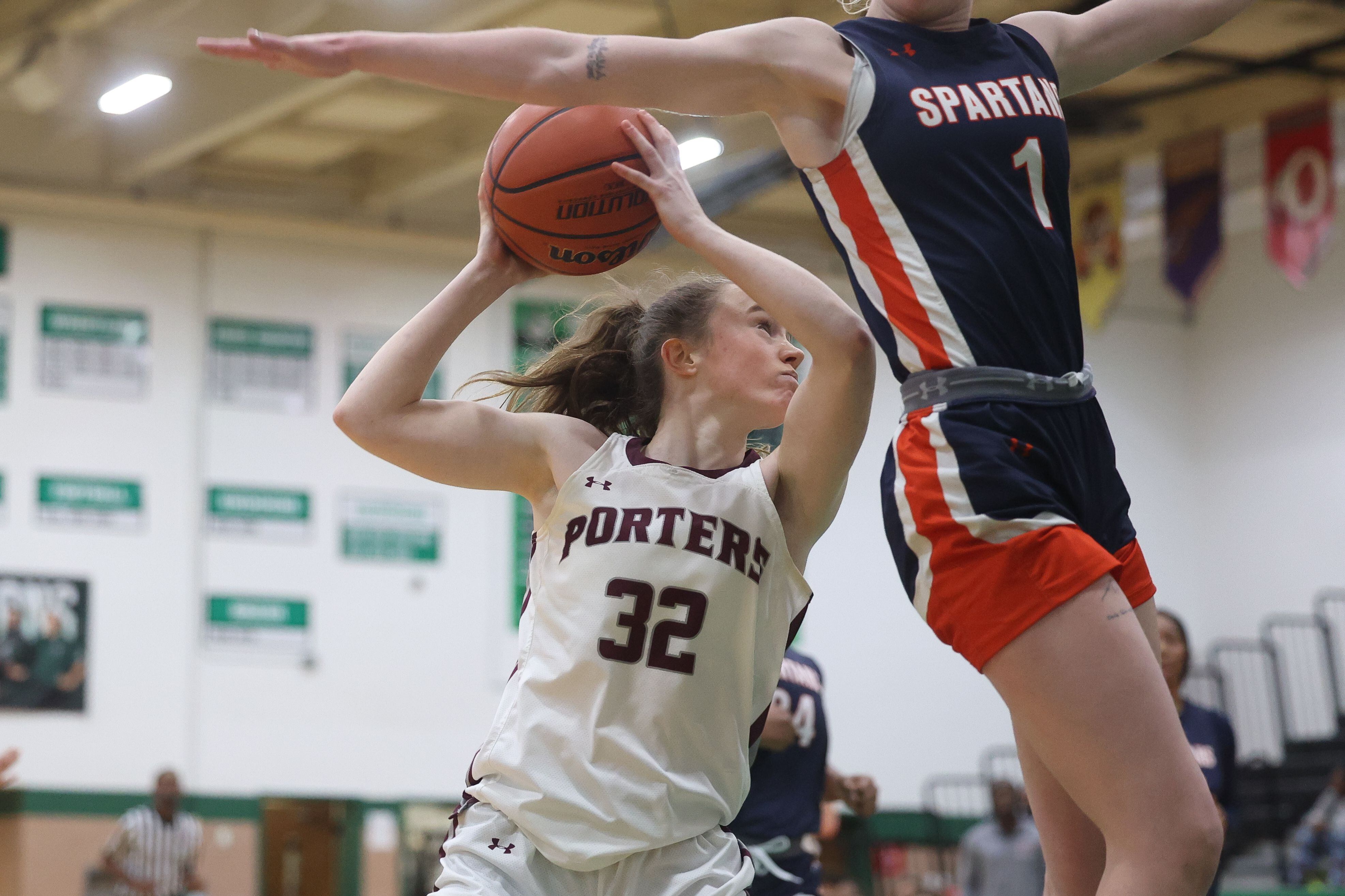 Lockport’s Lucy Hynes maneuvers around a Romeoville defender for the the basket in the Oak Lawn Holiday Tournament championship on Saturday, Dec.16th in Oak Lawn.