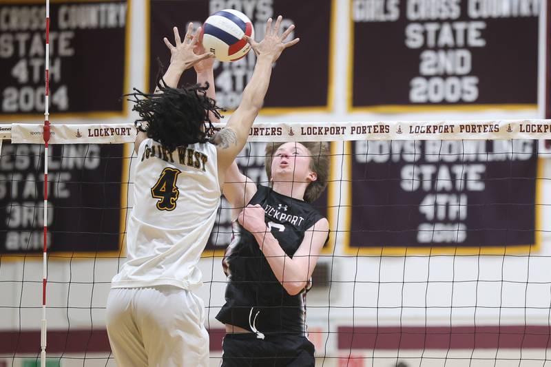 Lockport’s Zack Johnson hits a contested shot against Joliet West on Tuesday, March 31, 2026 in Joliet.
