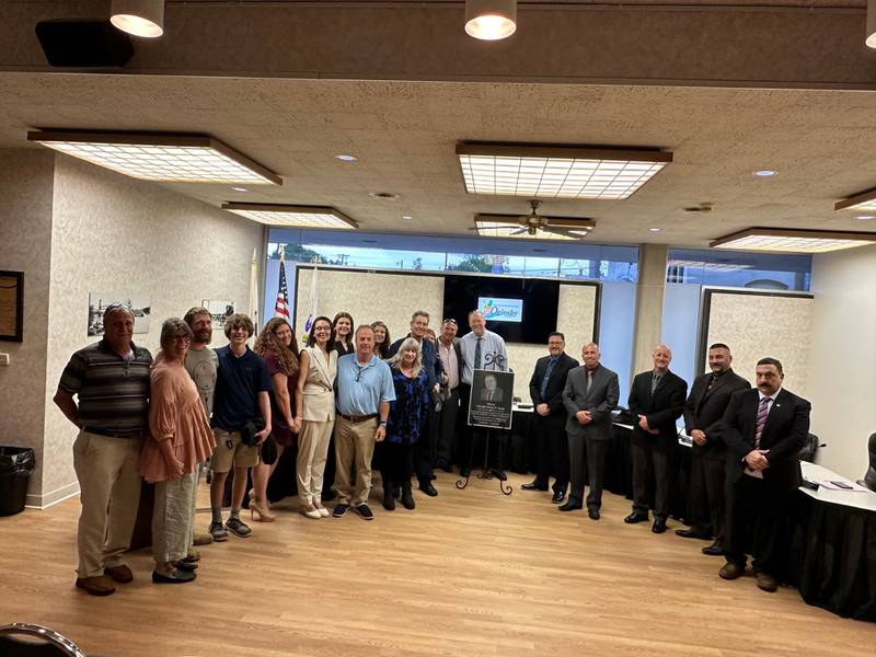 Thank you, Jerry. Members of the Oglesby City Council and family members of former Mayor Gerald Scott, who died last year at age 87, flank a plaque honoring Scott's 20 years as mayor. The Oglesby City Council issued a proclamation Monday, May 6, 2024, honoring Scott and decreeing the plaque will be permanently displayed at Oglesby City Hall.