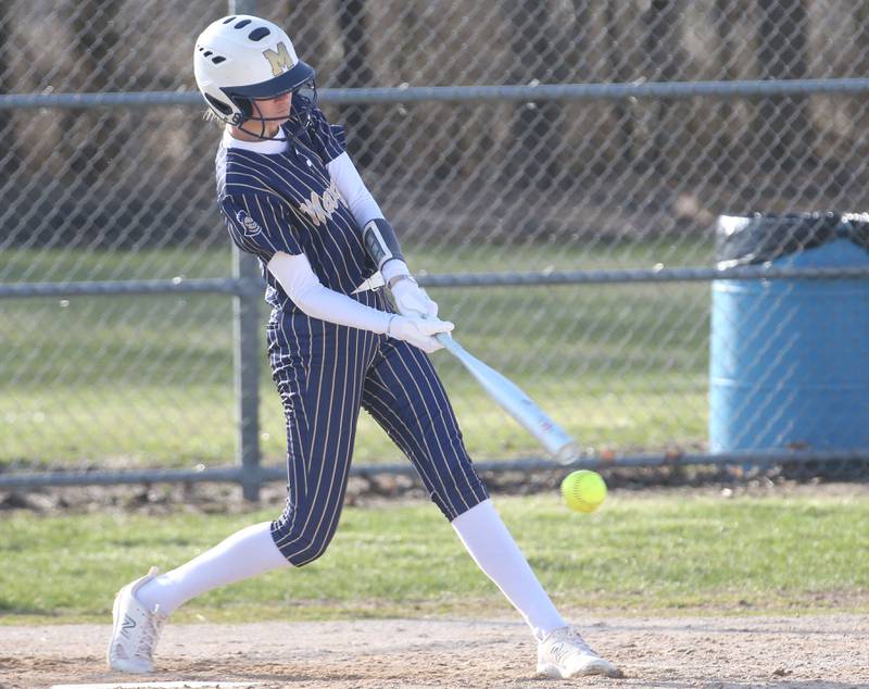 Marquette's Avery Durdan makes contact with the ball against Serena on Wednesday, March 26, 2025 at Serena High School.