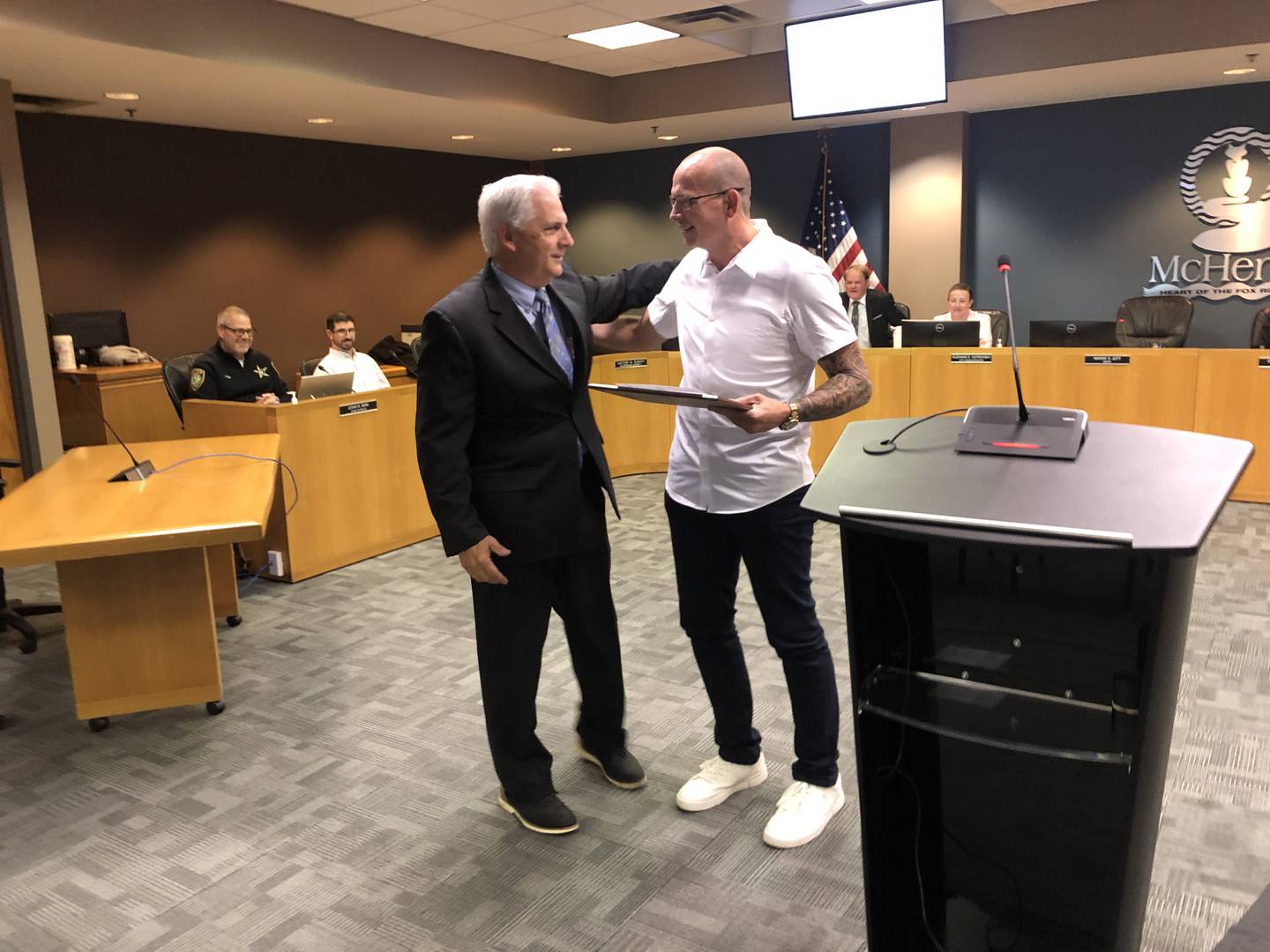 McHenry First Ward Alderman Victor "Vic" Santi received a plaque from Mayor Wayne Jett on Monday, April 21, 2025, noting Santi's 20 years on the McHenry Council.