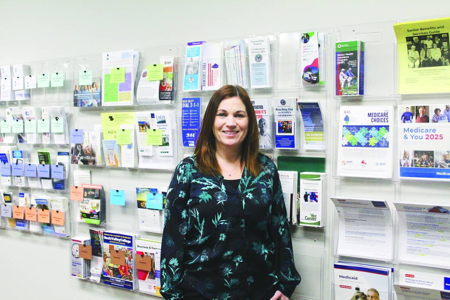 Rock River Center executive director Jamie Nobis oversees a staff in Oregon who can help seniors, the disadvantaged and caregivers with information and benefits they need to make their lives a little better. A wall with plenty of pamphlets and booklets is available on one of its walls, and Nobis can point out where is what for whatever they need. "It's a wonderful place to work, and you meet a lot of wonderful people," Nobis said. "I like helping people in the variety of things that we do, and every day is different. There's always a new program or a new client."