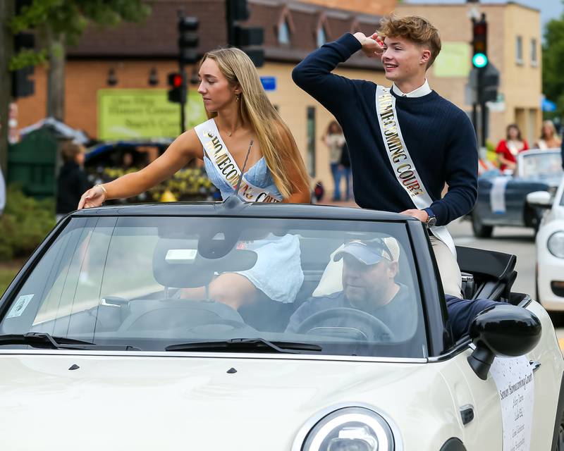 Students of the homecoming court ride in the Glenbard West Homecoming Parade.  Sept 16, 2023