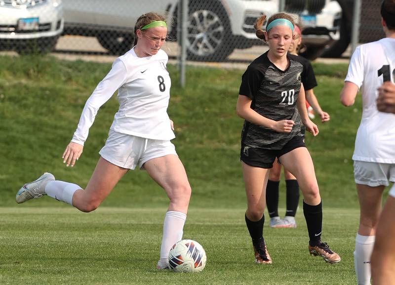 Prairie Ridge's Grace Smith shoots the ball in front of Sycamore's Cortni Kruizenga during their game Wednesday, May 17, 2023, at Sycamore High School.