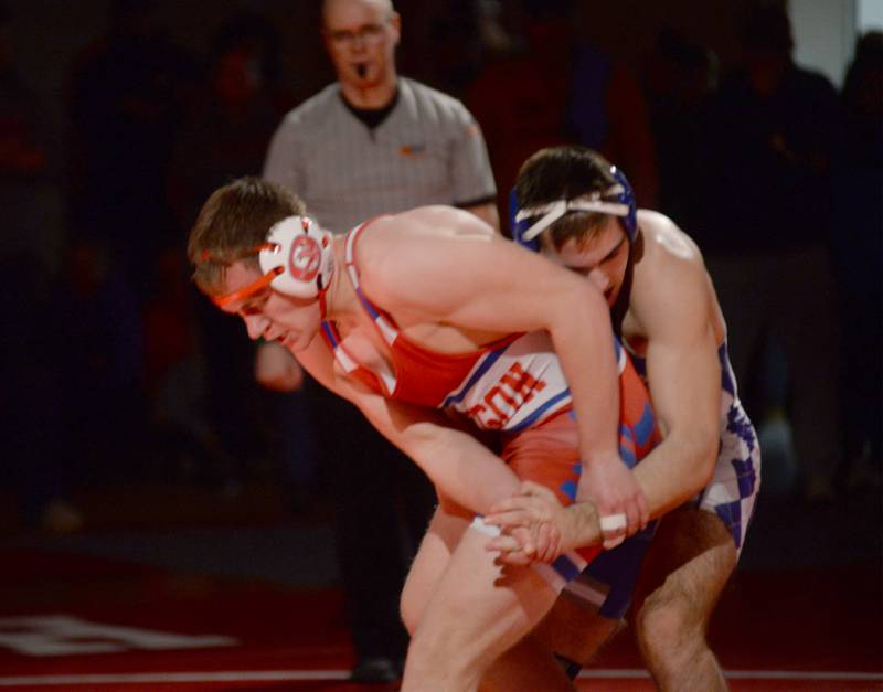Oregon's Seth Rote tries to break the grip of Newman's Matthew Clemen during their 190-pound match at the 1A team sectional held Tuesday, Feb. 25, 2025 in the Blackhawk Center in Oregon.