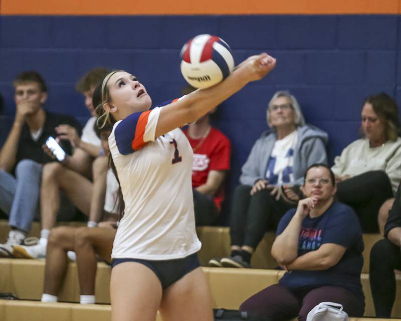 Romeoville's Aubree Westerfield (1) digs during volleyball match between Romeoville at Oswego. Oct 16, 2025.