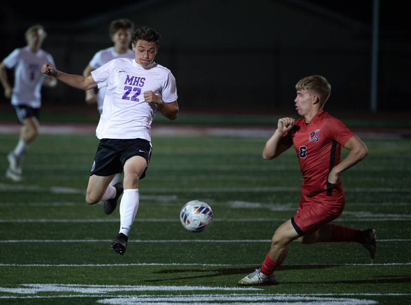 Manteno's Ben Froeschle, left, plays the ball as Bradley-Bourbonnais' Jack Watters, right, comes on to defend in a game on Tuesday, September 16, 2025.
