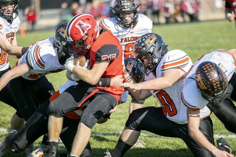 Amboy’s Brayden Klein fights for yards against FCW Saturday, Nov. 4, 2023 in the 8-man semifinal game in Amboy.