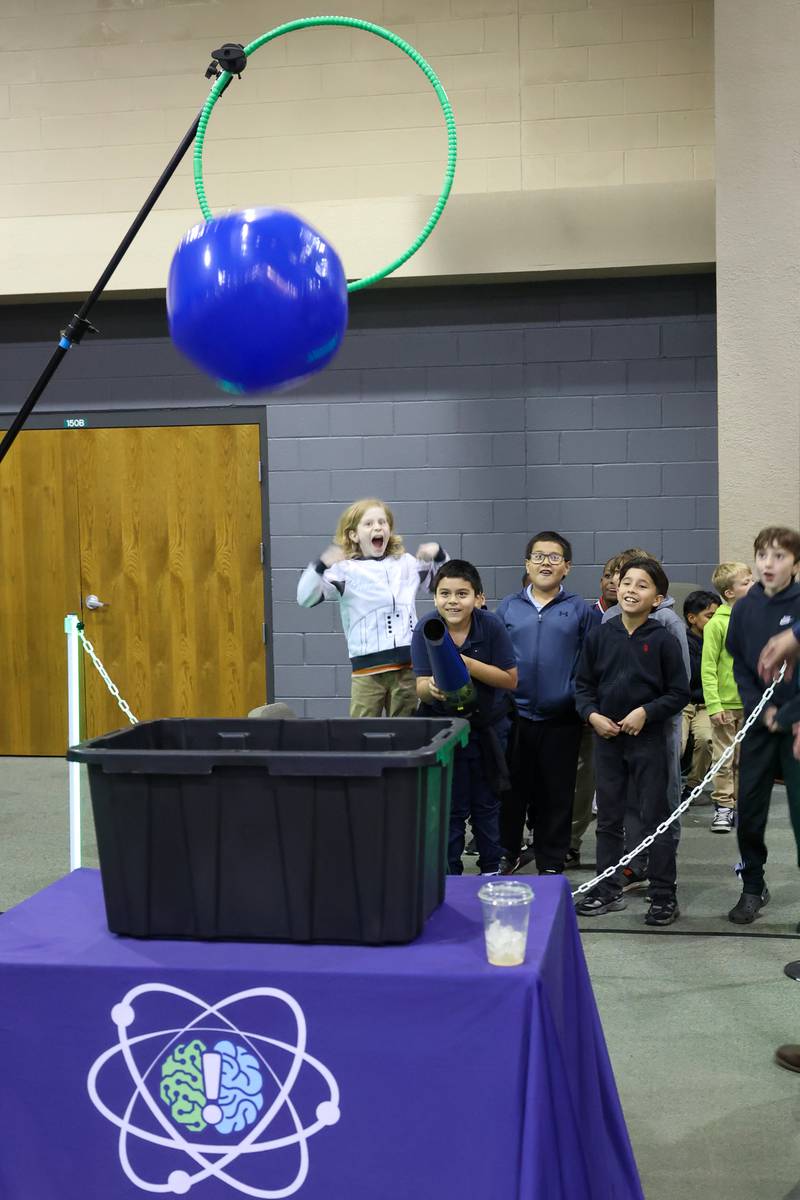 Kankakee students cheer as classmate Tadeo Carmona succeeds in a challenge during the Impossible Science event at the Kankakee First Church of the Nazarene on May 5, 2026.