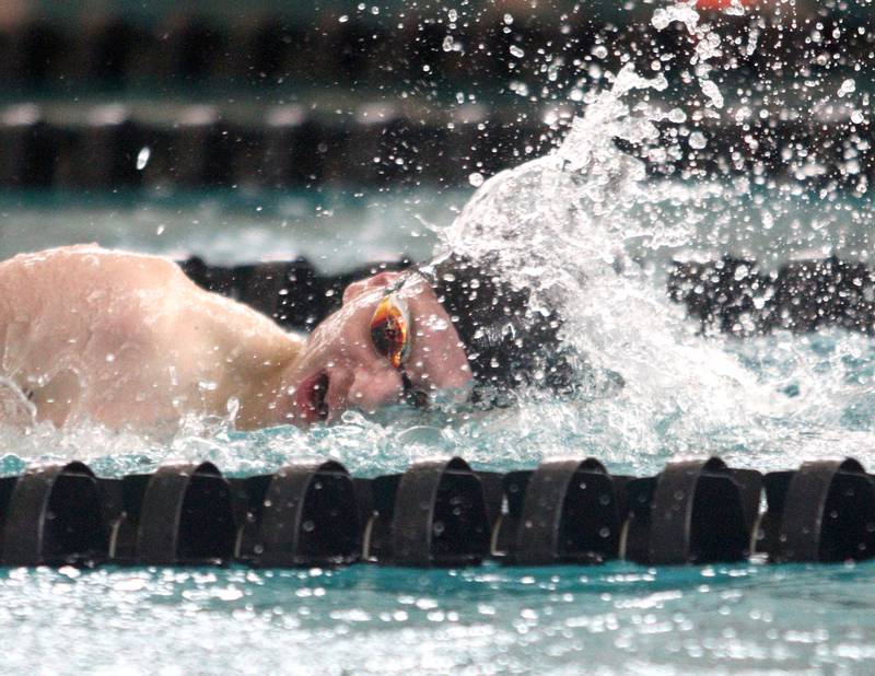 Drew Watson of Cary-Grove co-op swims the 200-Yard Individual Medley during the Fox Valley Conference Swimming Championships at Woodstock North High School Saturday.