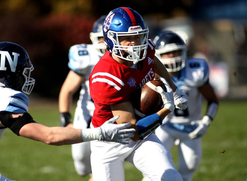 Marmion's Anthony Kuceba carries the ball during a Class 5A second-round game against Nazareth Academy in Aurora on Saturday, Nov. 6, 2021.