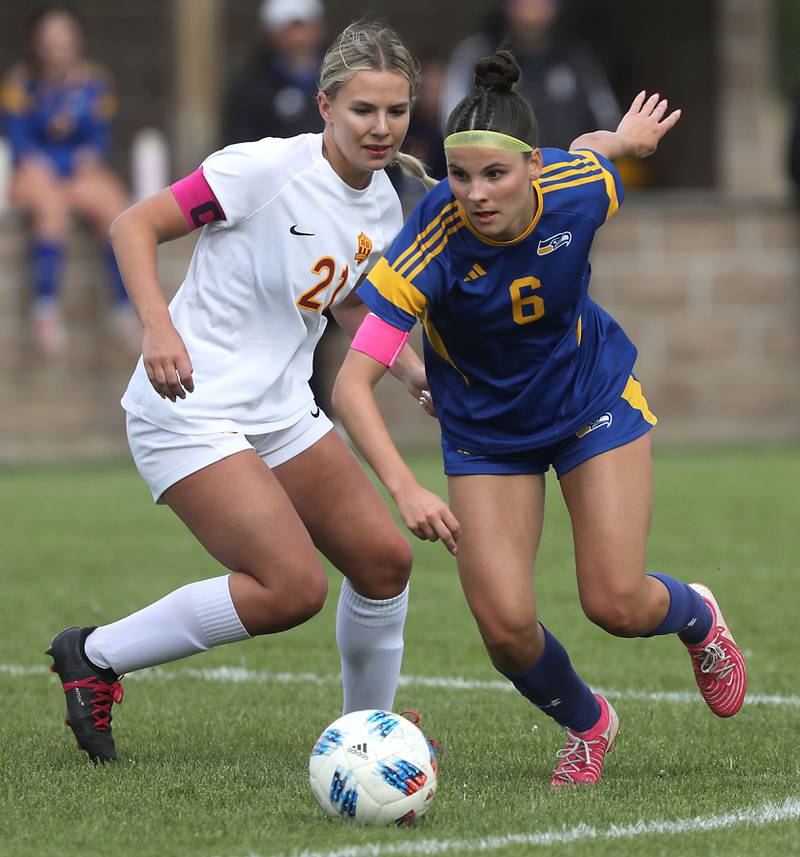 Johnsburg's Liz Smith (right) makes a break to the ball as she is defended by Richmond-Burton's Blake Frericks during the Kishwaukee River Conference Girls Soccer Tournament Championship match on Wednesday, May 6, 2026, at Johnsburg High School.