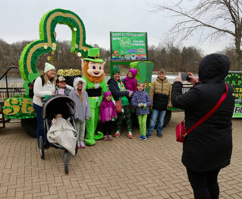 The Lupole and Bauman Familes take a photo with a leprechaun at the
Yorkville Parks and Recreation St. Patrick's Day Celebration on
Saturday, March 14, 2026 in Yorkville.