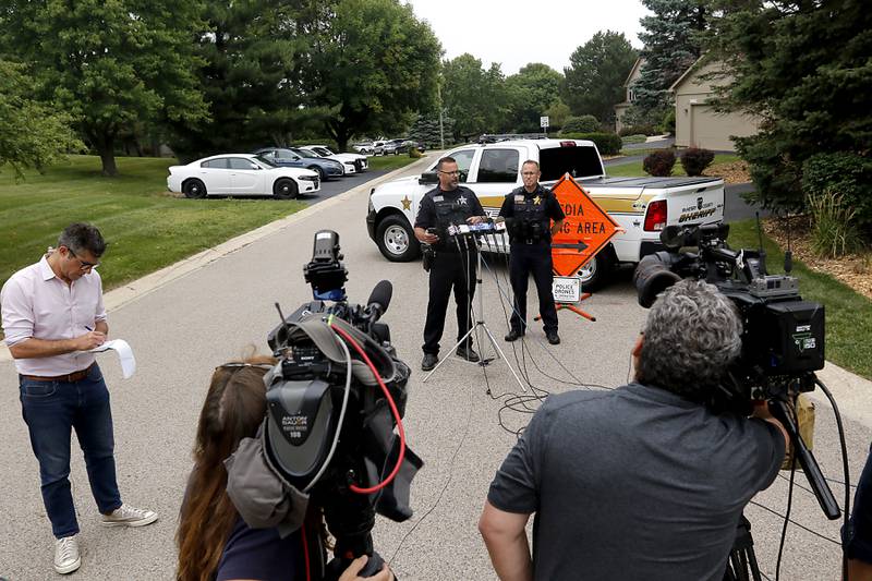 Tim Creighton, from the McHenry County Sheriff's office, (left) and Chief of Operations Mike Muraskey give an update on a domestic incident in which four people were killed on Wednesday Aug. 9, 2023, in the 5800 block of Wild Plum Road in unincorporated Crystal Lake. Police said they were family members.