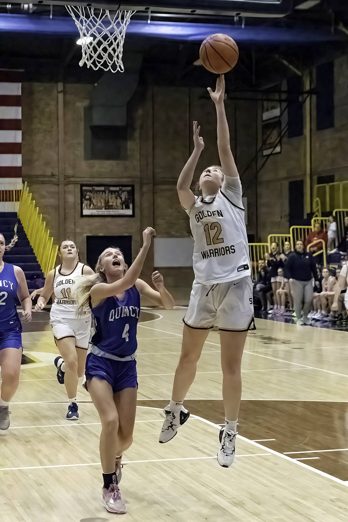 Sterling’s Olivia Melcher puts in a lay-up against Quincy Saturday, Jan. 28, 2023.