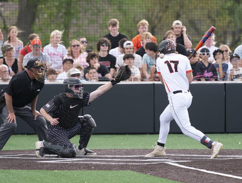 McHenry's Donovan Christman is hit by a pitch during their game against Prairie Ridge on Friday, May 16, 2025 at McHenry High School.