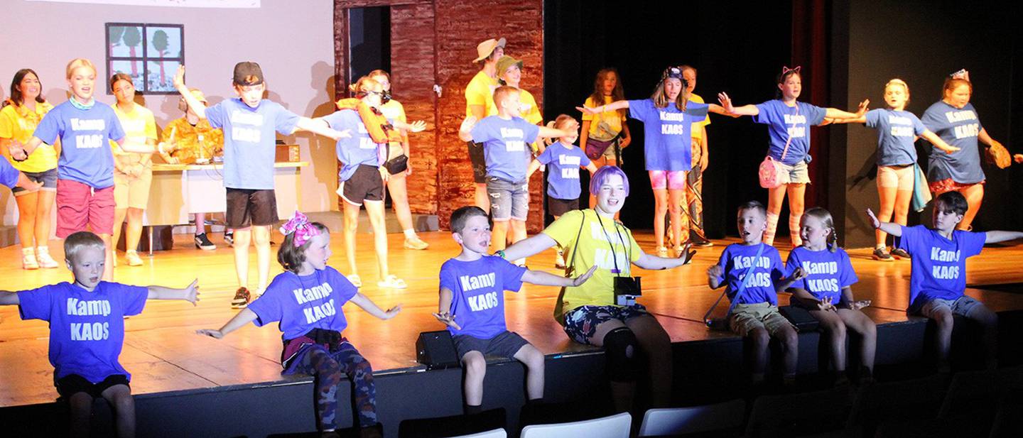 The cast of "Kamp Kaos" performs a scene during rehearsal.