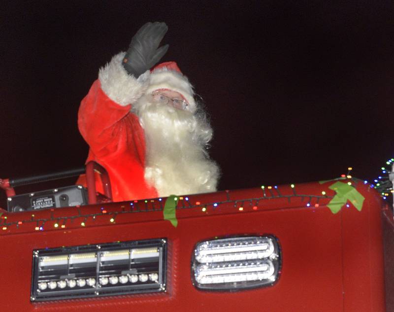 Santa arrives at the Utica Community Hall Saturday night after visiting every neighborhood during the annual Utica Fire Dept. Santa Parade.