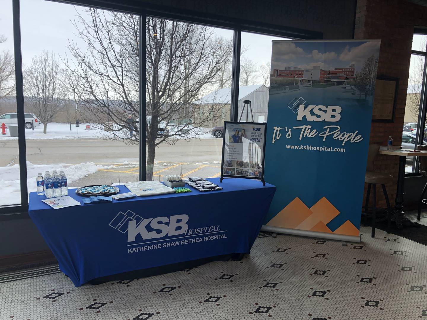 KSB Hospital in Dixon set up a welcome stand at its healthcare job fair Friday at the Auditorium Ballroom in downtown La Salle.