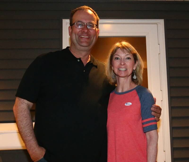 Peru mayor candidate Ken Kolowski, and his wife Michelle, are excited as they pose for a photo on their front porch outside their home in Peru.